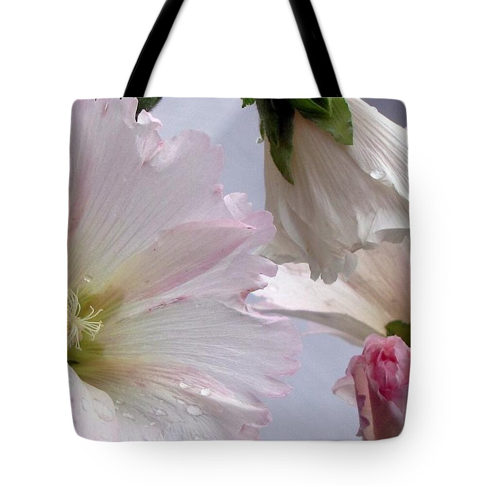 Hollyhock Tote Bag featuring the photograph Hollyhocks by Jennifer Wheatley Wolf