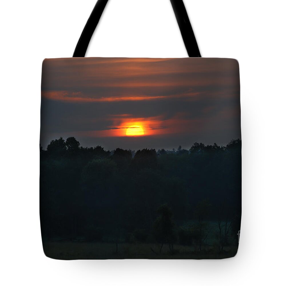 Sunsets Tote Bag featuring the photograph Hot Hazy Sunset by Cheryl Baxter