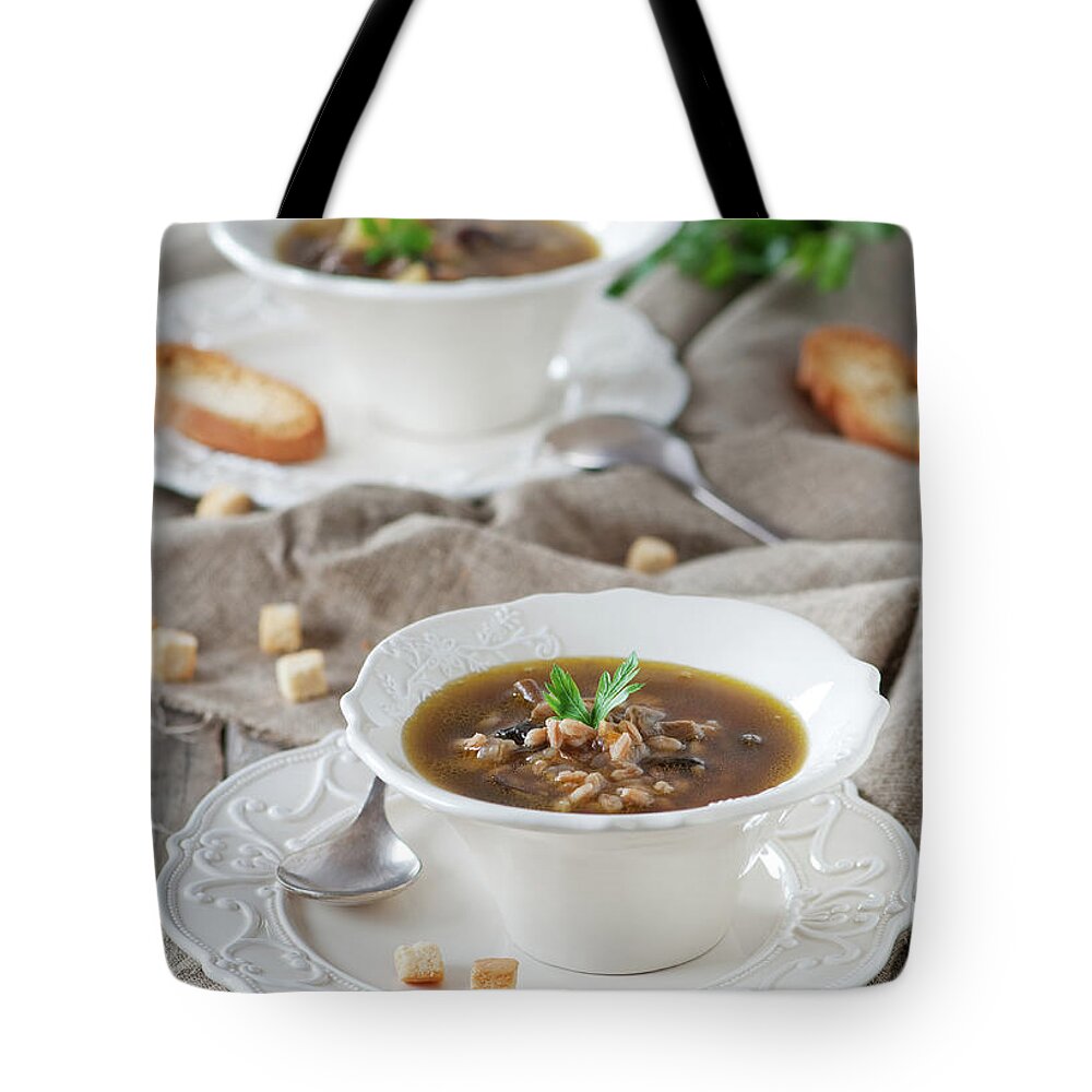 Edible Mushroom Tote Bag featuring the photograph Hot Soup With Musroom by Oxana Denezhkina