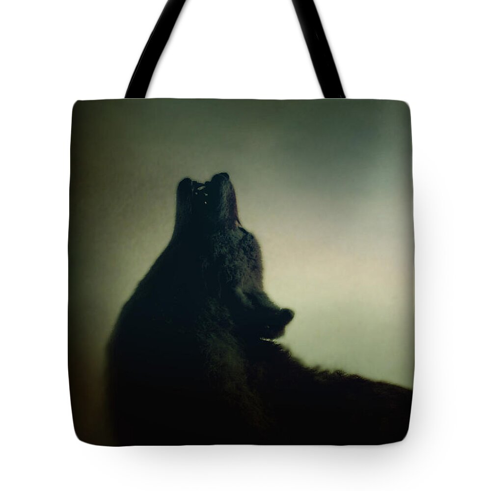 Wolf Tote Bag featuring the photograph Howling by Margie Hurwich