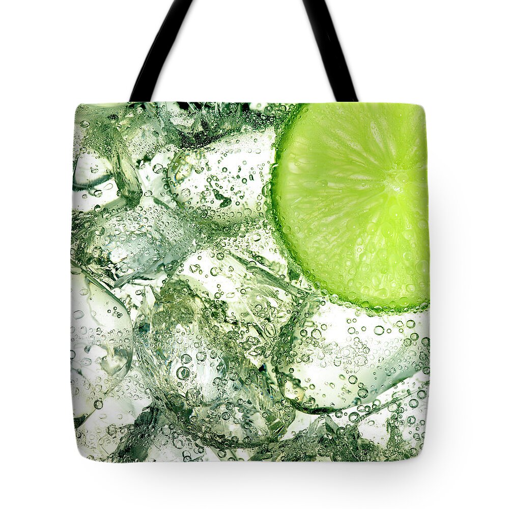 White Background Tote Bag featuring the photograph Ice And Lime by Anthony Bradshaw