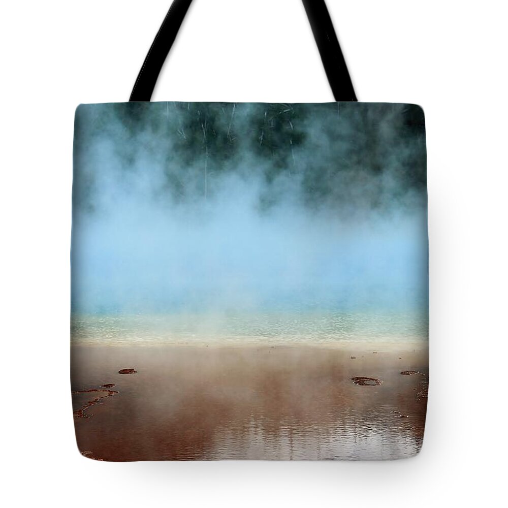 Yellowstone National Park Tote Bag featuring the photograph Ice Blue and Steamy by Catie Canetti