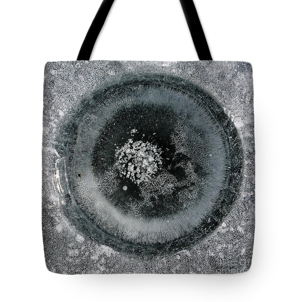 Ice Tote Bag featuring the photograph Ice fishing hole 9 by Steven Ralser