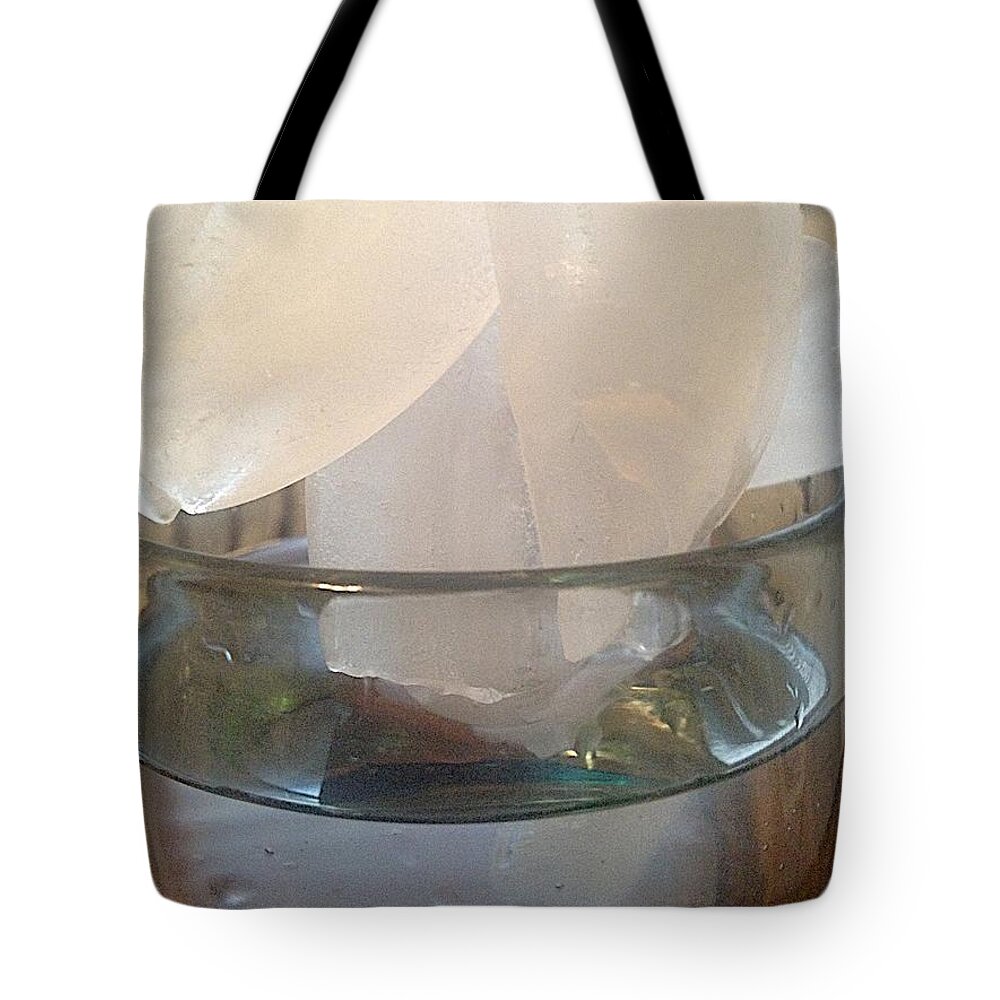 Glass Of Water Tote Bag featuring the photograph Ice by Joseph Yarbrough