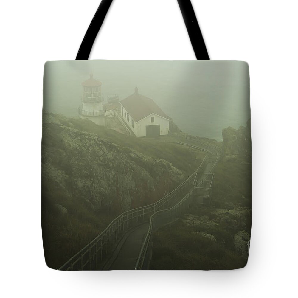 Lighthouse Tote Bag featuring the photograph In The Fog by Paul Gillham