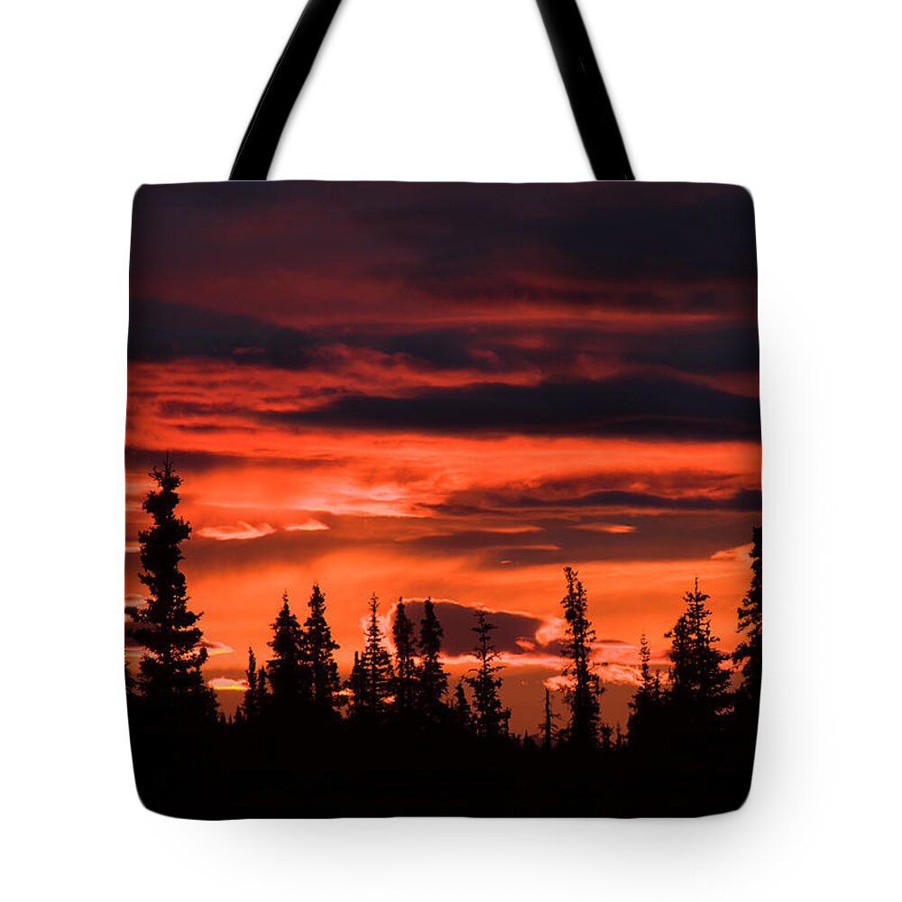 Sunrise Photography Tote Bag featuring the photograph Incredible red clouds over Denali by Jeff Folger