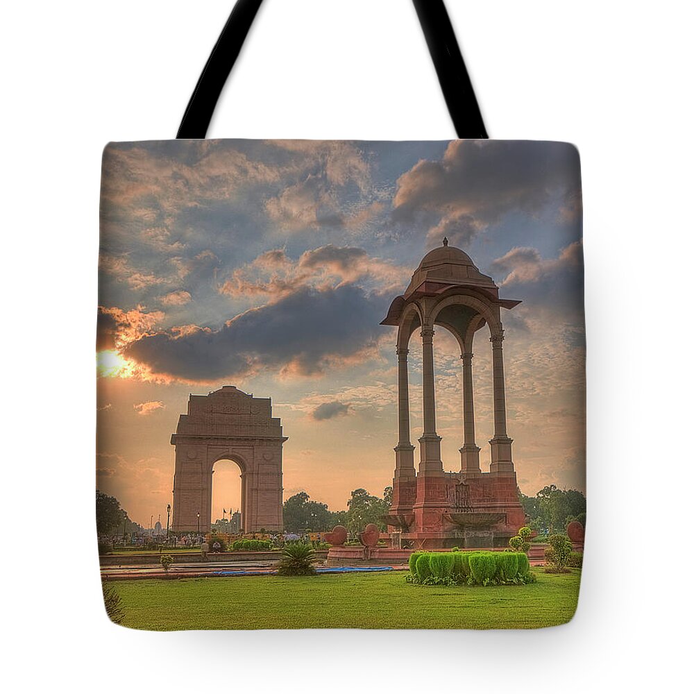 Tranquility Tote Bag featuring the photograph India Gate And Canopy At Sunset by Mukul Banerjee Photography
