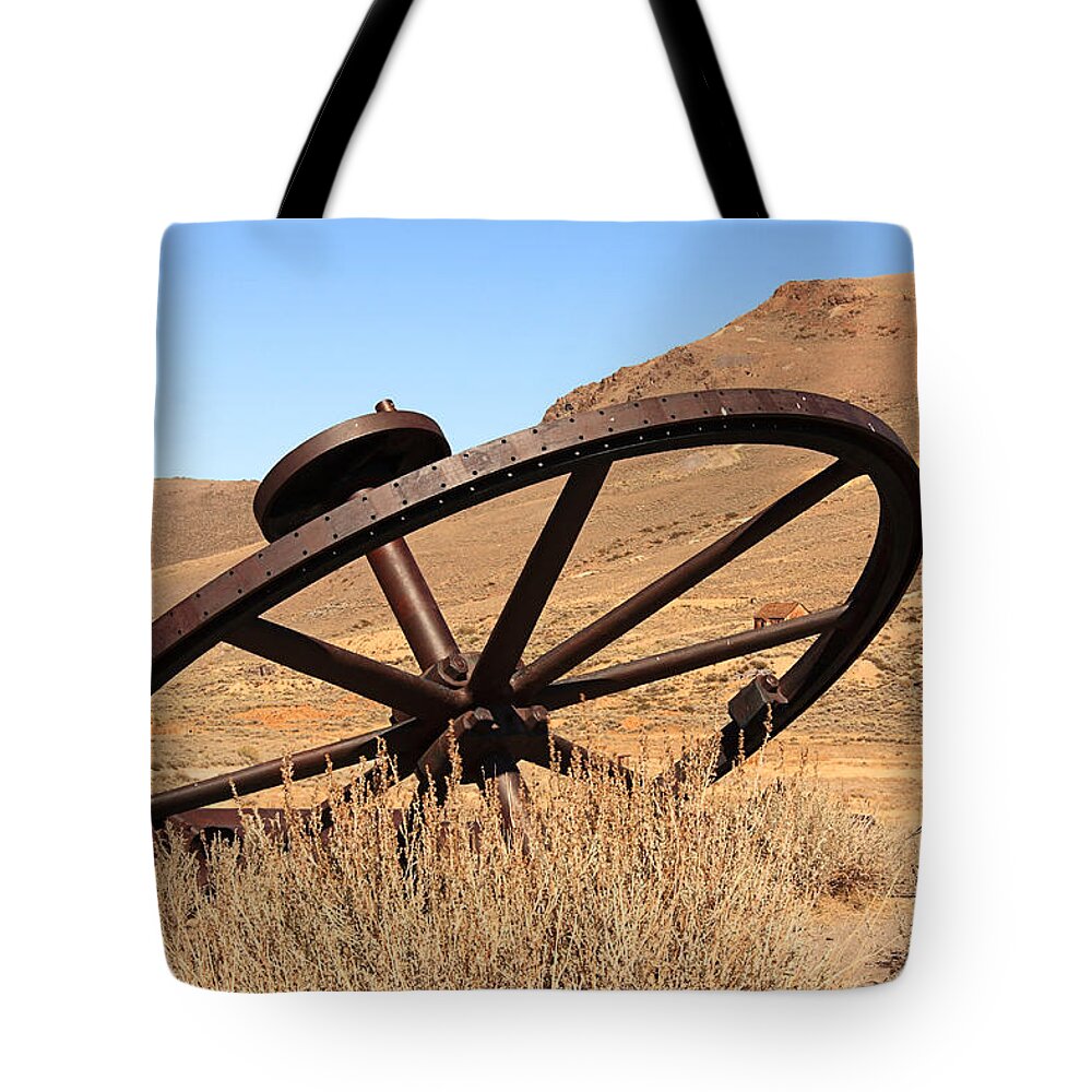 Bodie Ghost Town Tote Bag featuring the photograph Industrial Wheel by Sue Leonard
