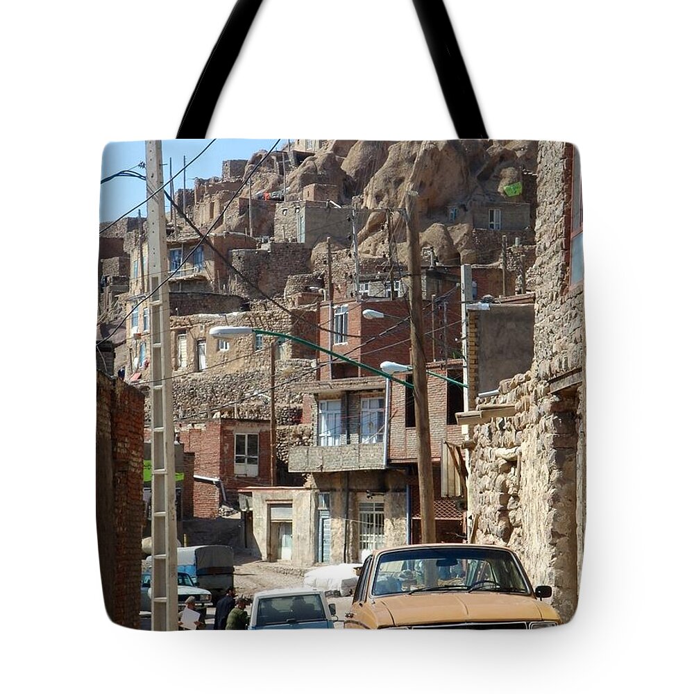 Kandovan Tote Bag featuring the photograph Iran Kandovan Cars and Wires by Lois Ivancin Tavaf