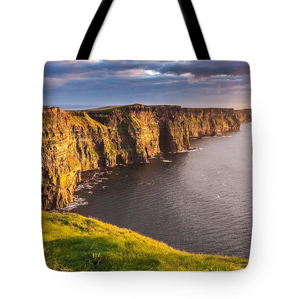 Cliffs Of Moher Tote Bag featuring the photograph Ireland's Iconic landmark The Cliffs of Moher by Pierre Leclerc Photography