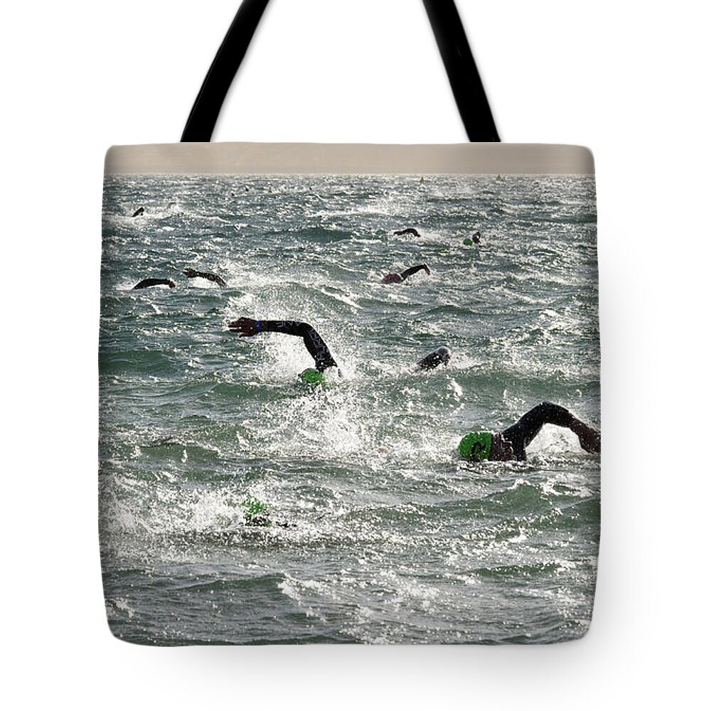 Ironman Tote Bag featuring the photograph Ironman 2012 Sheer Determination by Bob Christopher