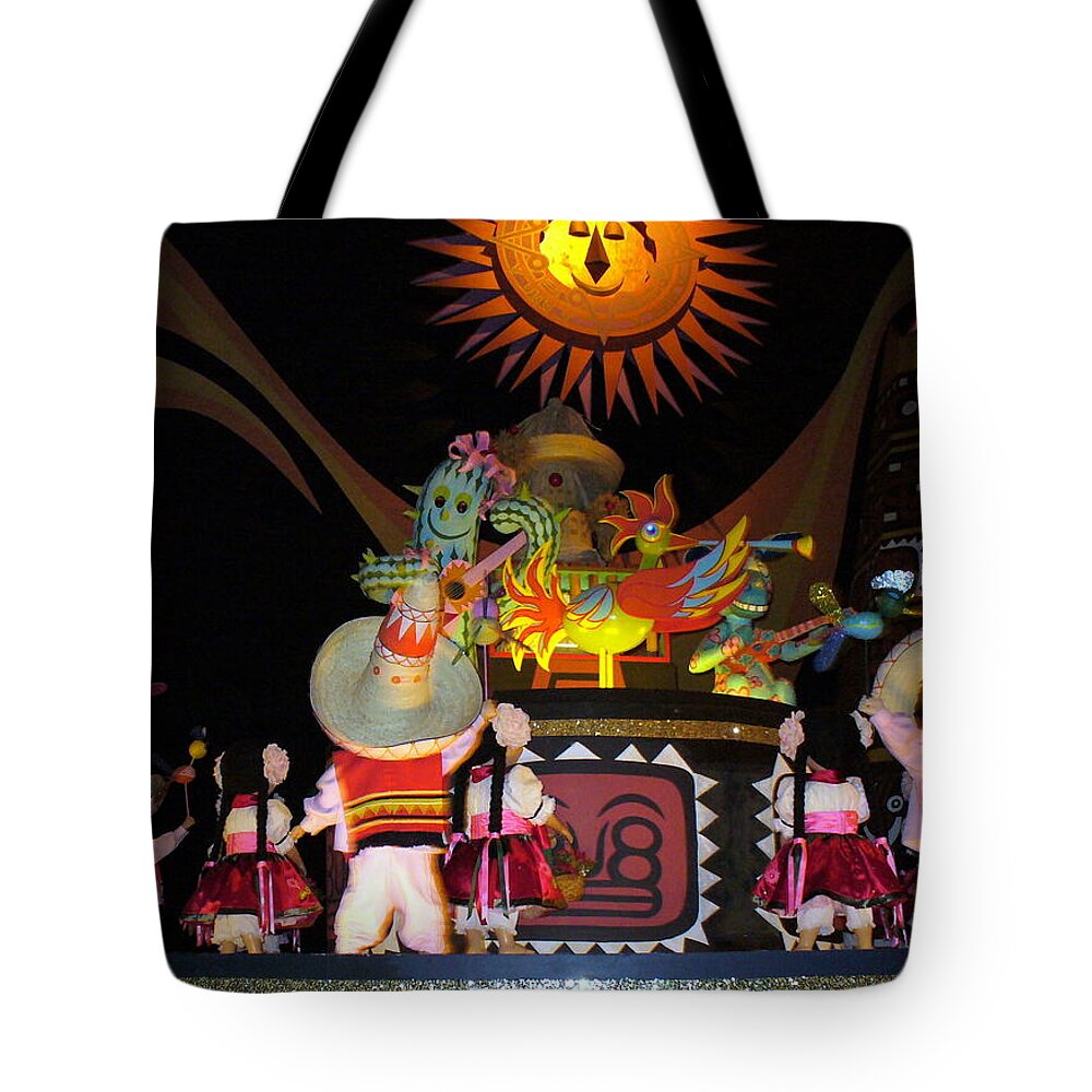 It's A Small World Ride Tote Bag featuring the photograph It's A Small World with dancing Mexican character by Lingfai Leung