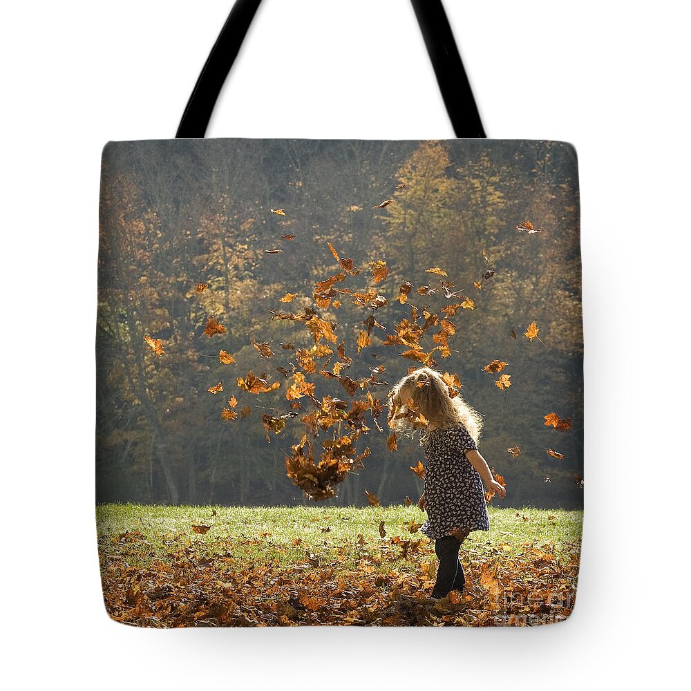 Autumn Tote Bag featuring the photograph It's Raining Leaves by Carol Lynn Coronios
