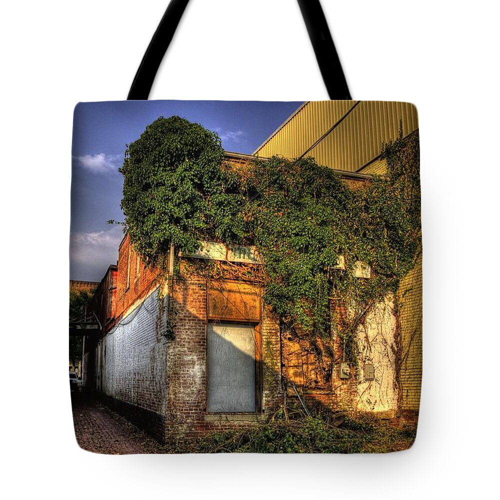 Marietta Tote Bag featuring the photograph Ivy covered building by Jonny D
