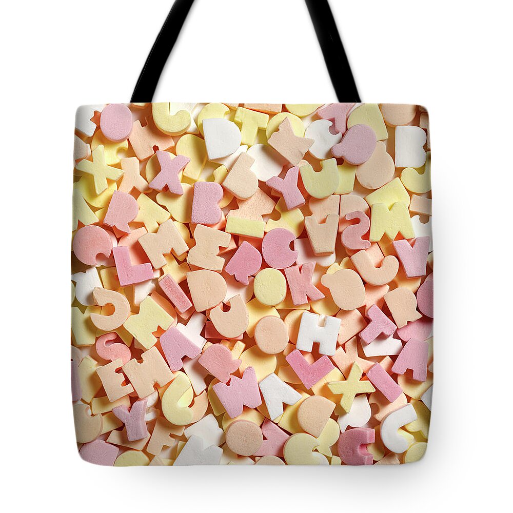 Unhealthy Eating Tote Bag featuring the photograph Jumbled Sweets Depicting Dyslexia by Peter Dazeley