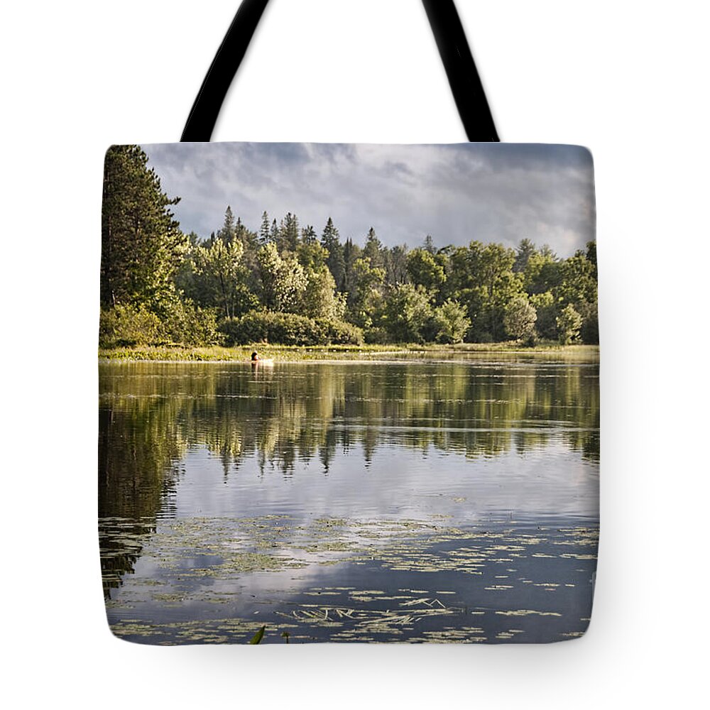 Lake Tote Bag featuring the photograph Kayak on the Lake by David Arment