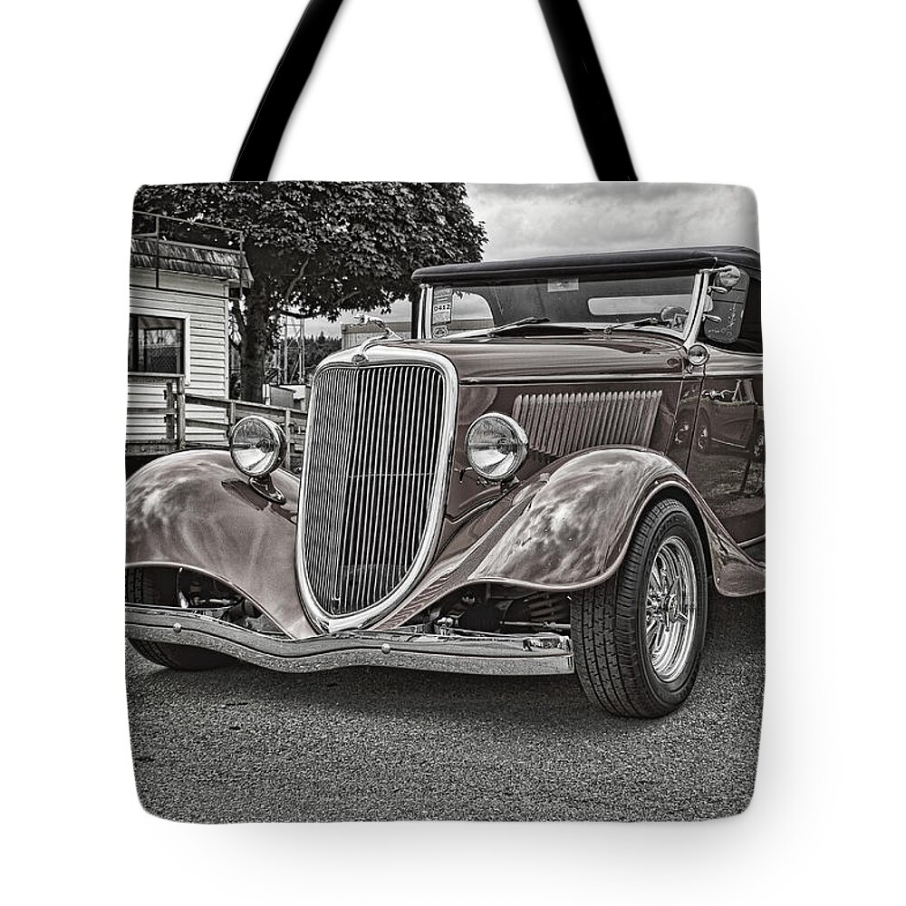 Black And White Tote Bag featuring the photograph King of the Road II by Ron Roberts