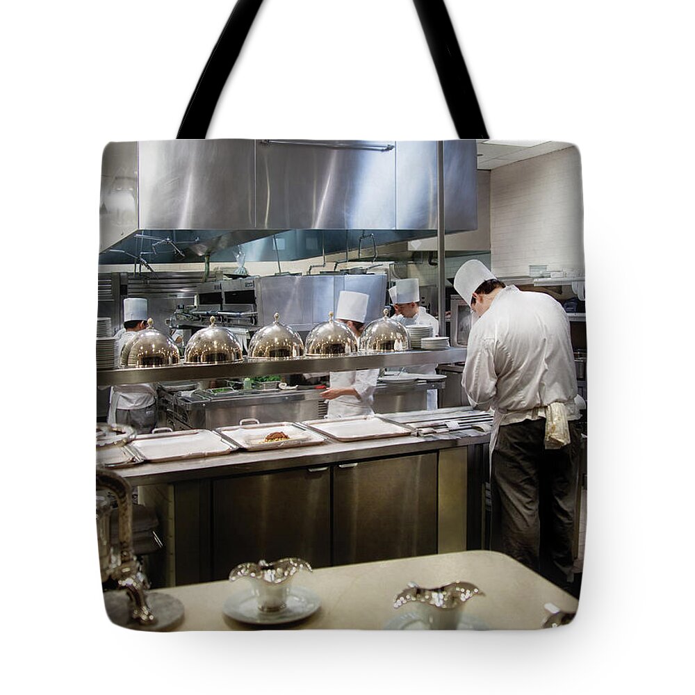 Kitchen Tote Bag featuring the photograph Kitchen - The chefs at the Eiffel Tower Restaurant by Mike Savad