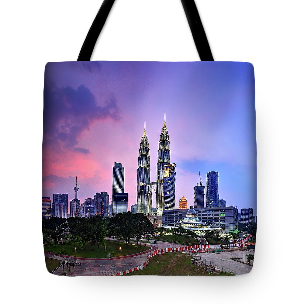 Built Structure Tote Bag featuring the photograph Kuala Lumpur In Sunset And Haze by Tuah Roslan