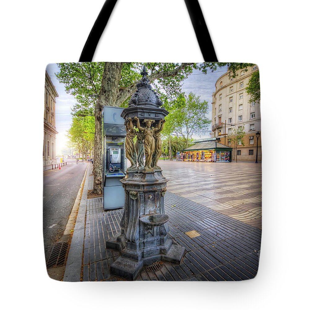 Yhun Suarez Tote Bag featuring the photograph La Rambla Fountain by Yhun Suarez