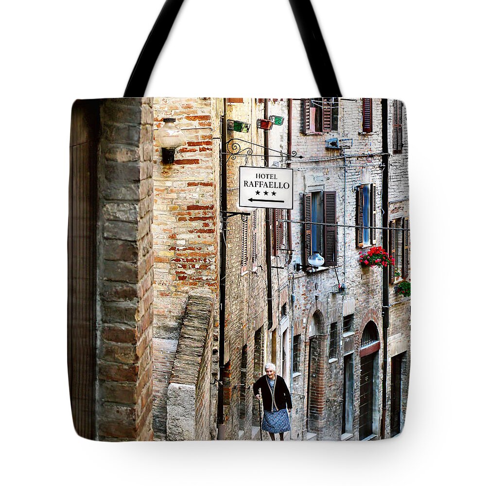 Urbino Tote Bag featuring the photograph Lady in Urbino by Jennie Breeze