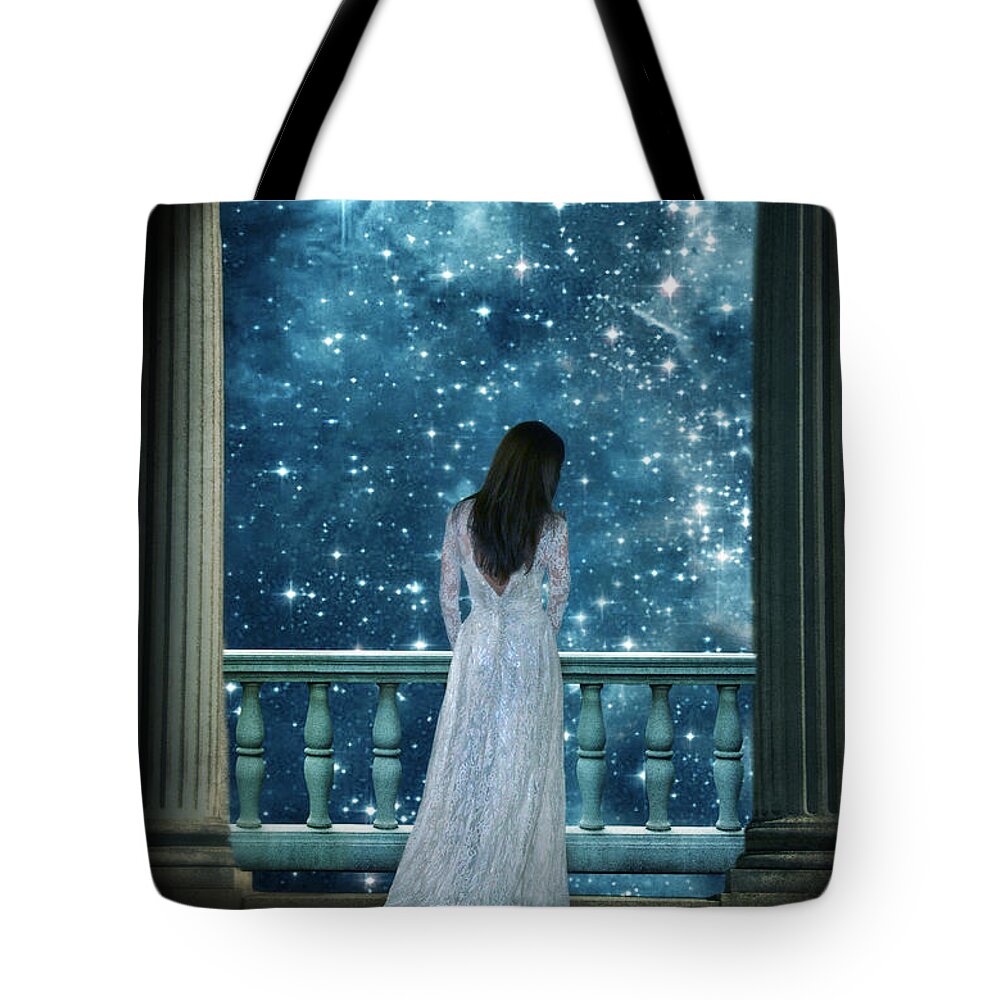 Woman Tote Bag featuring the photograph Lady on Balcony at Night by Jill Battaglia