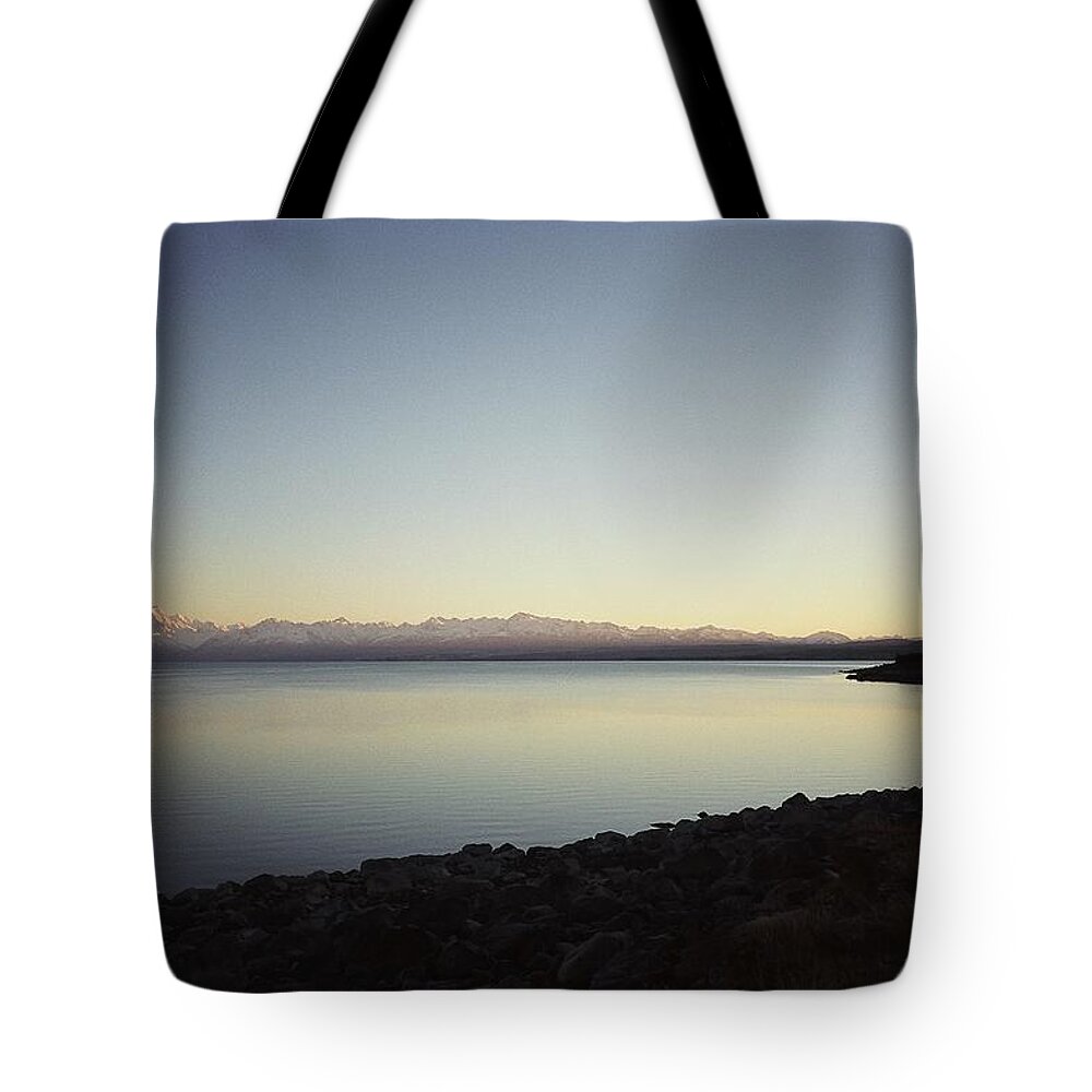 New Zealand Tote Bag featuring the photograph Lake Pukaki First Light by Peter Mooyman