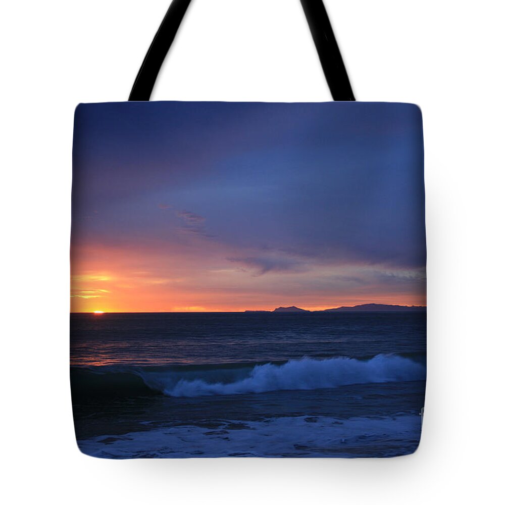 Ian Tote Bag featuring the photograph Last Ray of Sunlight at Pt Mugu with Wave by Ian Donley