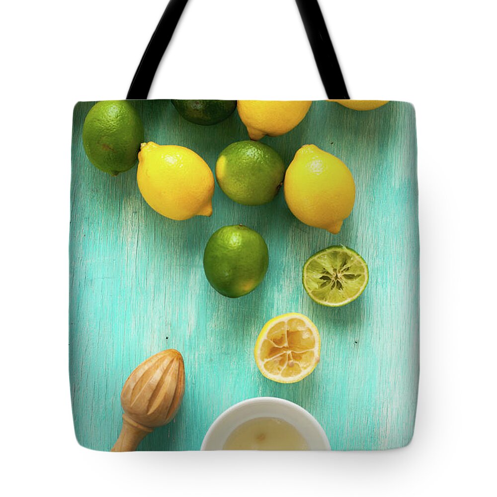 Large Group Of Objects Tote Bag featuring the photograph Lemon And Lime by Photo By Asri' Rie