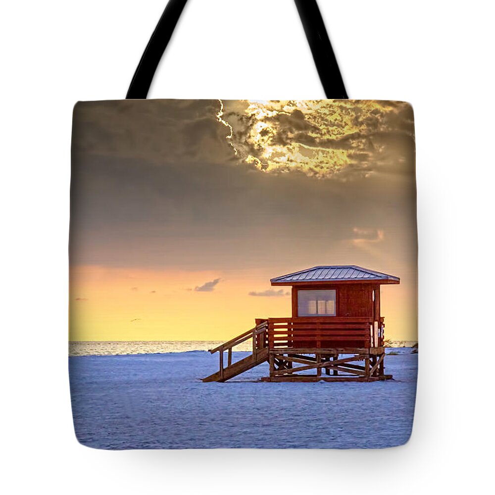 Clouds Tote Bag featuring the photograph Life Guard 1 by Marvin Spates