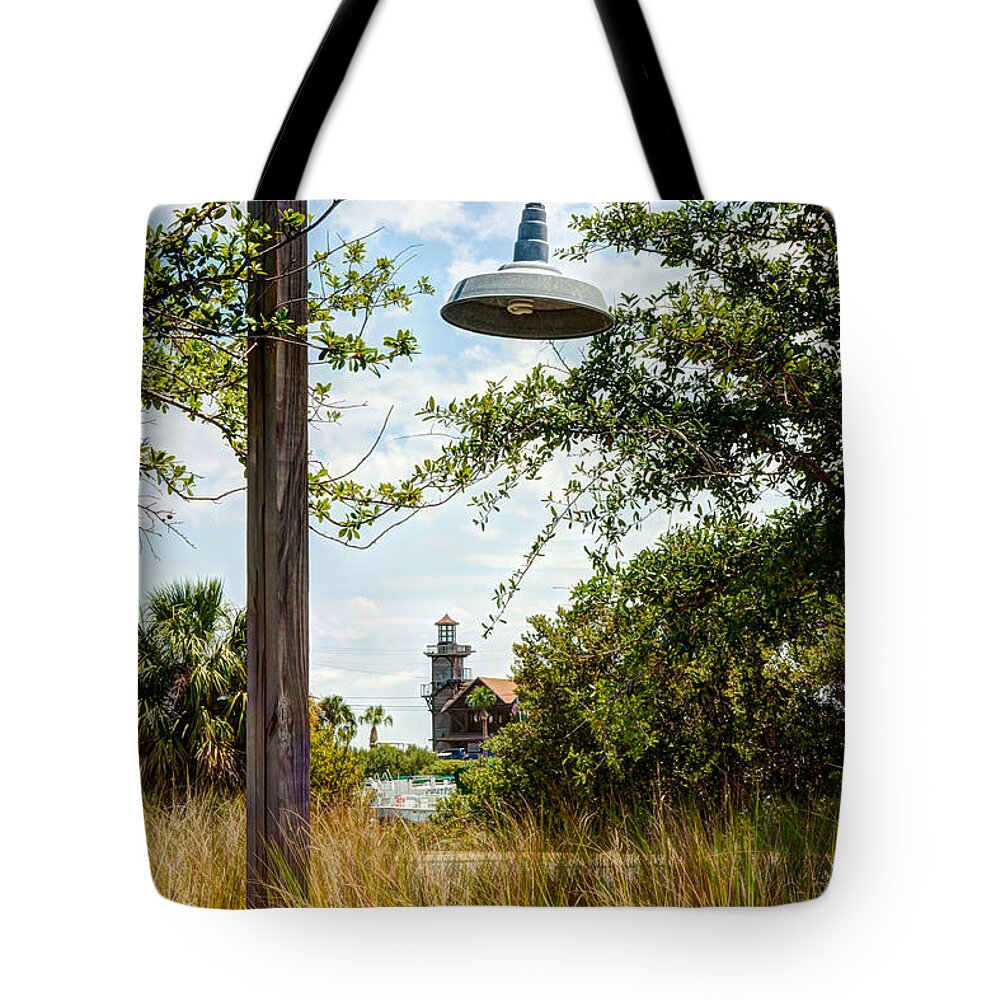 Cedar Key Tote Bag featuring the photograph Light and the Lighthouse by John M Bailey