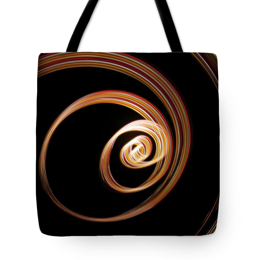 Black Background Tote Bag featuring the photograph Light Beams by Stilllifephotographer