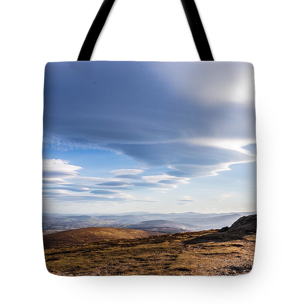 Blue Tote Bag featuring the photograph Lightfall on Djouce Mountain summit by Semmick Photo