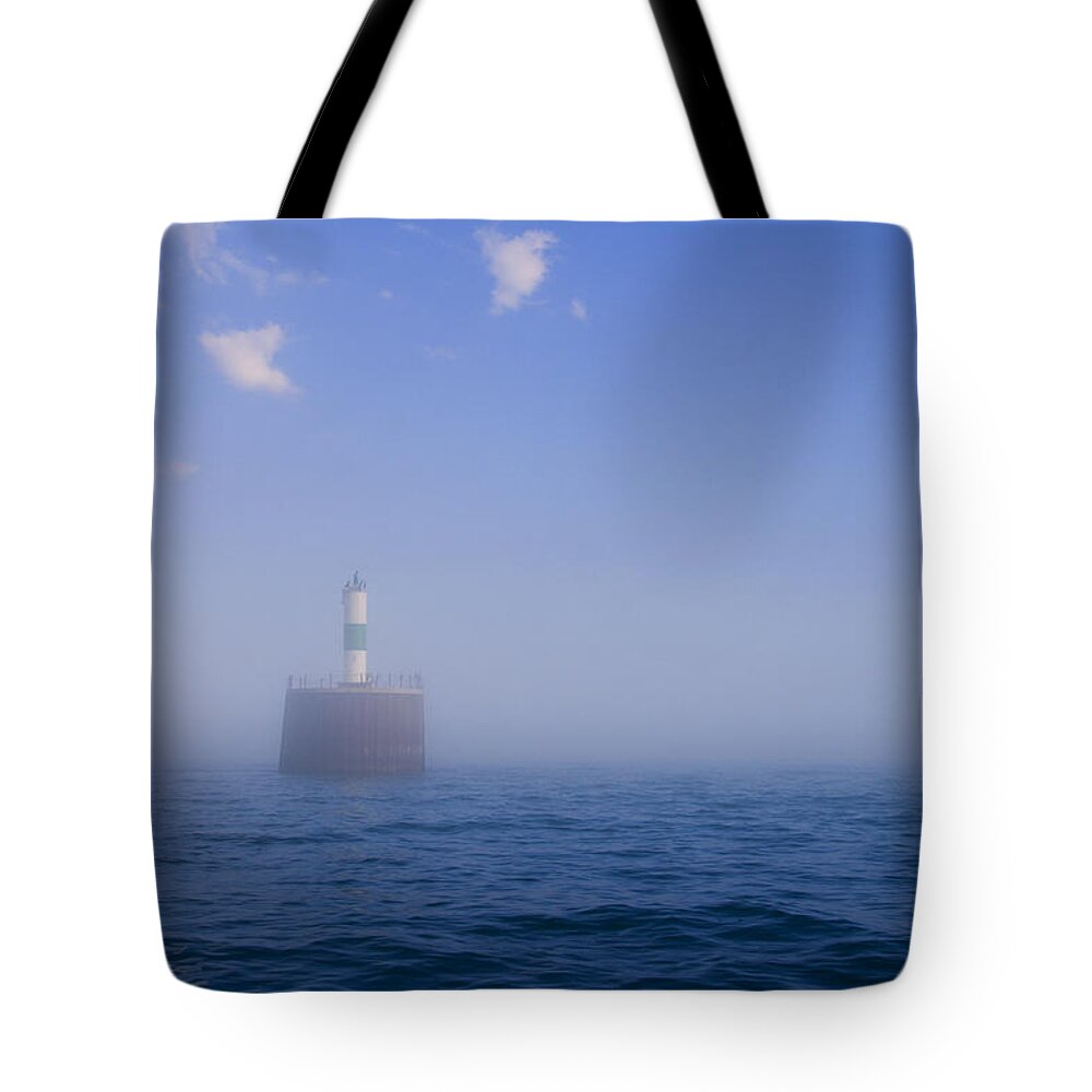 Lighthouse Tote Bag featuring the photograph Lighthouse in Fog by Alexey Stiop