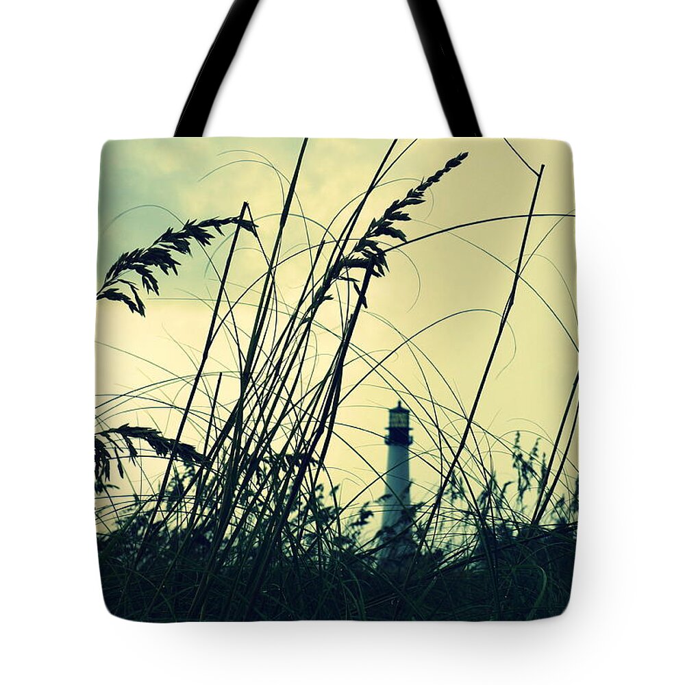 Lighthouse Tote Bag featuring the photograph Lighthouse in the distance by Laurie Perry