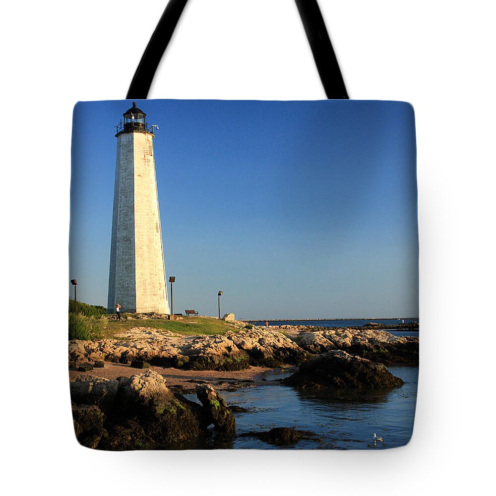 Lighthouse Tote Bag featuring the photograph Lighthouse Reflected by Karol Livote