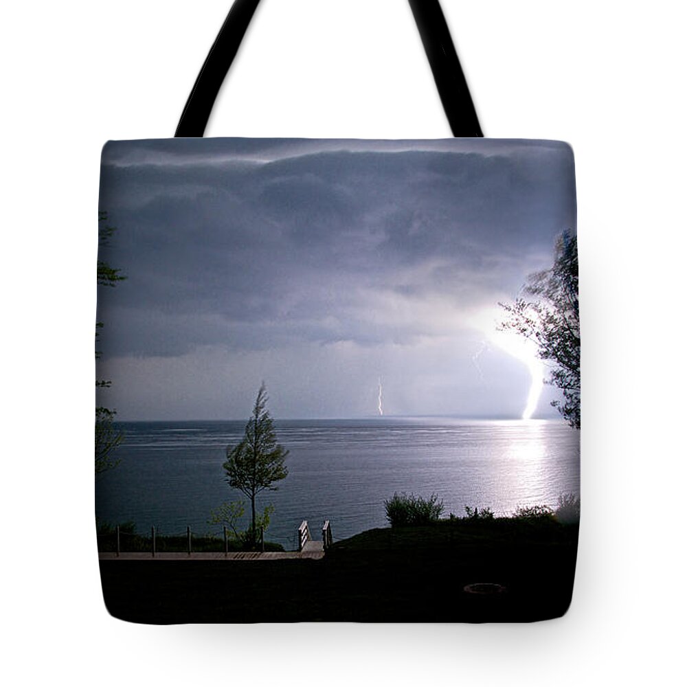 Landscapes Tote Bag featuring the photograph Lightning on Lake Michigan at Night by Mary Lee Dereske