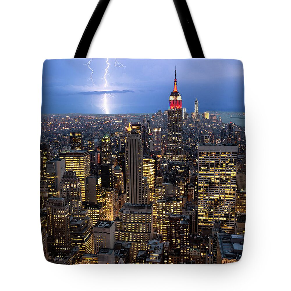 Risk Tote Bag featuring the photograph Lightning Striking Over Manhattan by Mike Hill