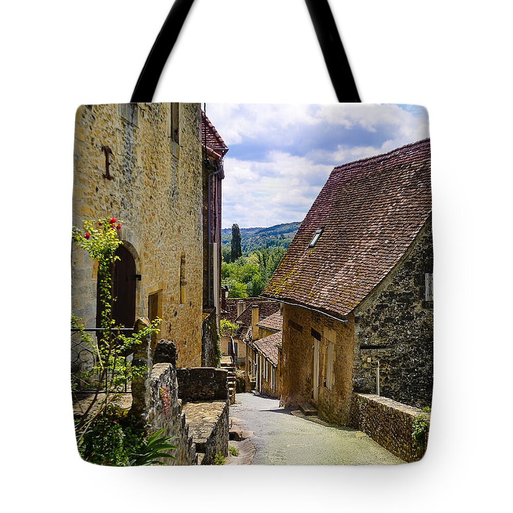 Limeuil Tote Bag featuring the photograph Limeuil en Perigord - France by Dany Lison