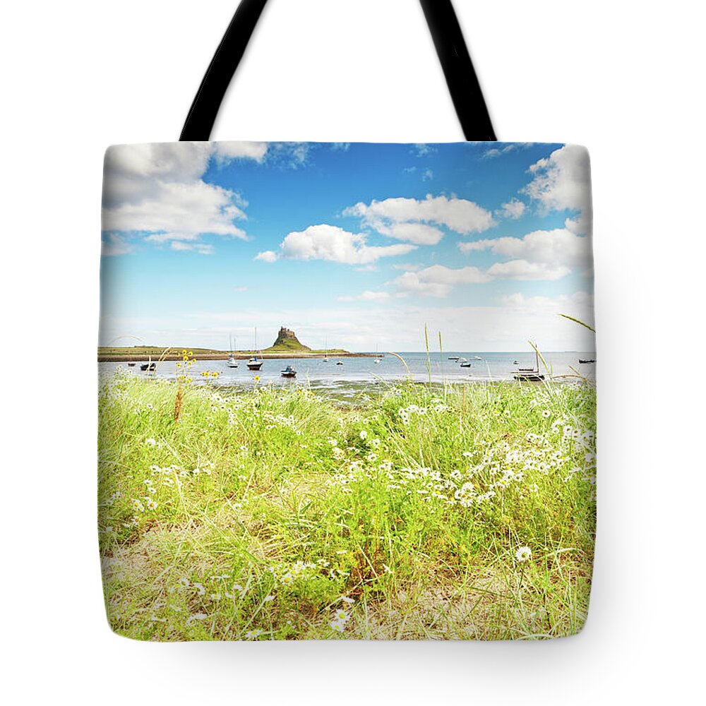 Grass Tote Bag featuring the photograph Lindisfarne by Alphotographic