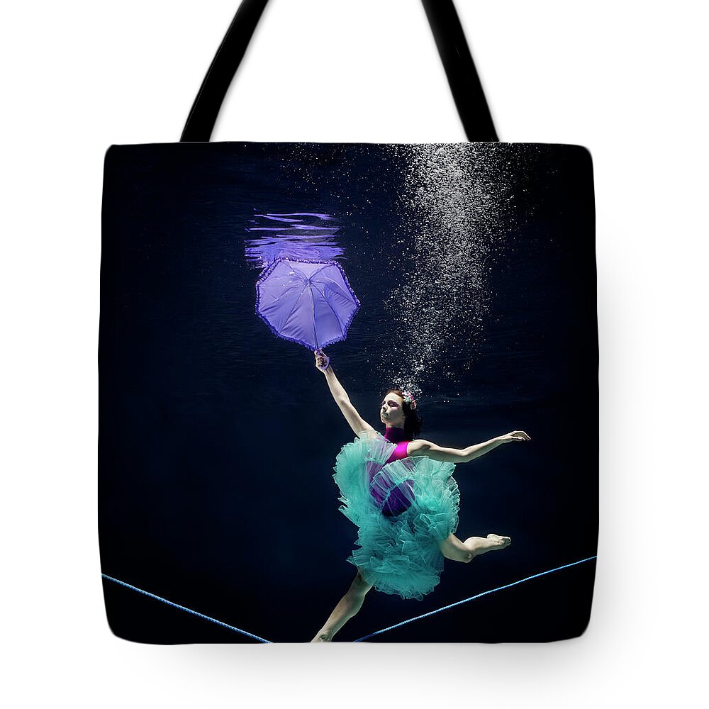 Ballet Dancer Tote Bag featuring the photograph Line Dancer Underwater by Henrik Sorensen