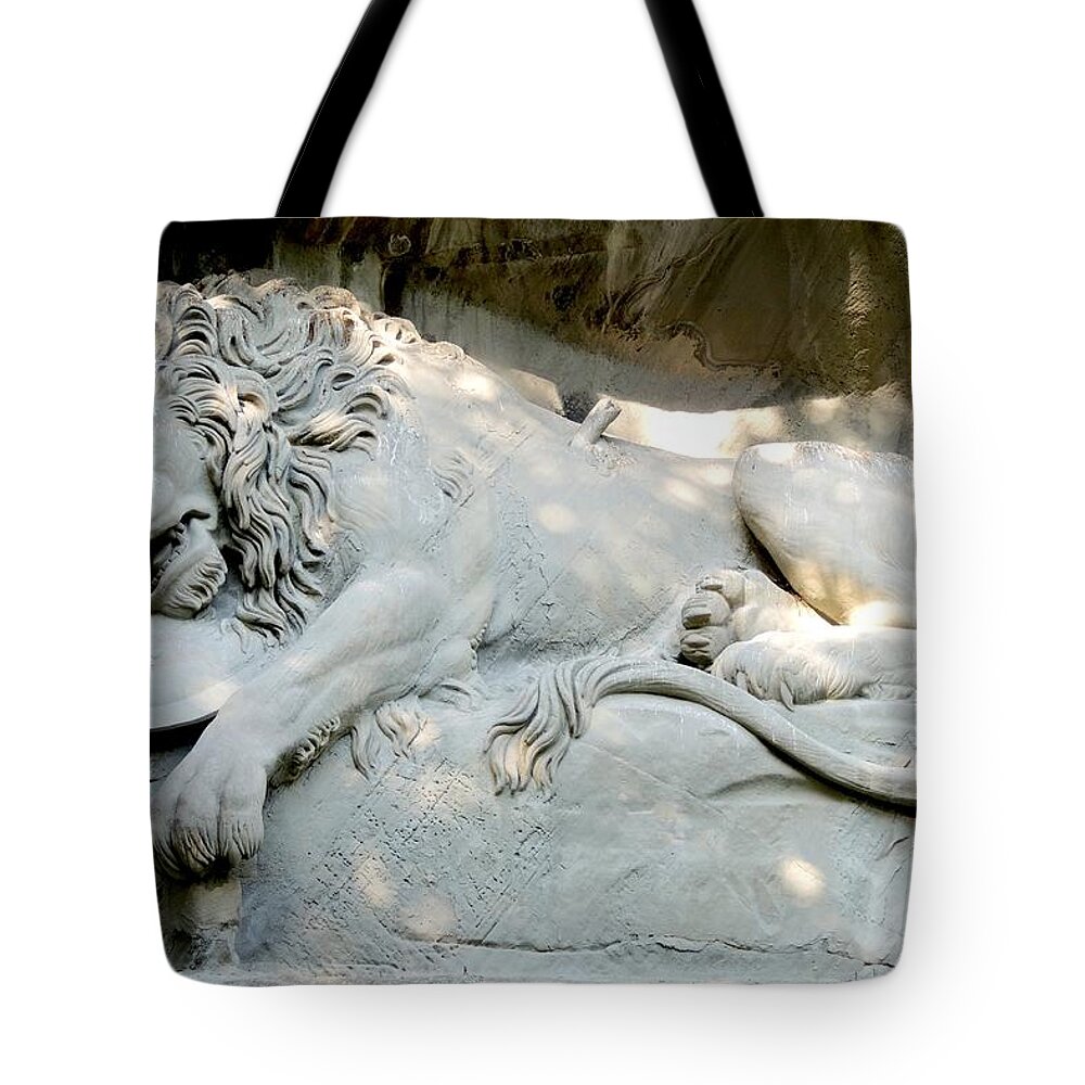 Europe Tote Bag featuring the photograph Lion Monument in Lucerne Switzerland by Marilyn Burton