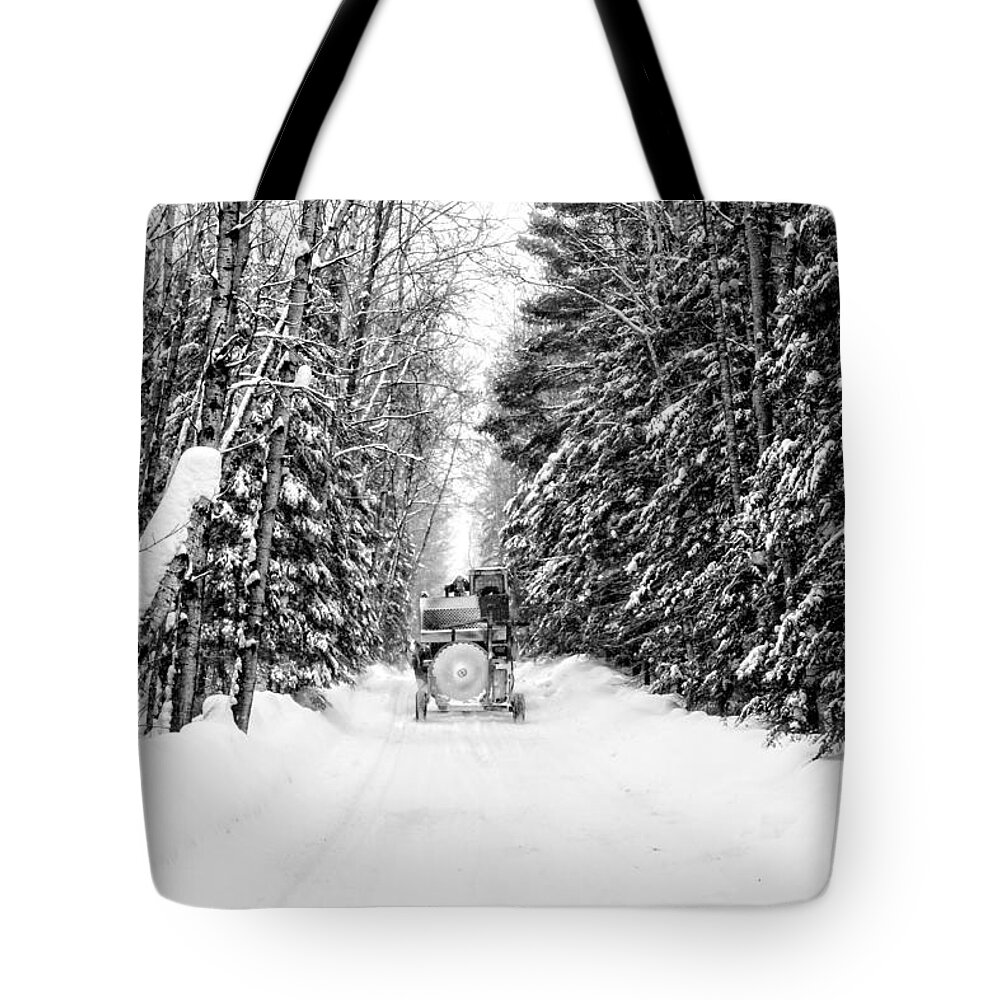 Minnesota Tote Bag featuring the photograph Logger's commute by Lori Dobbs