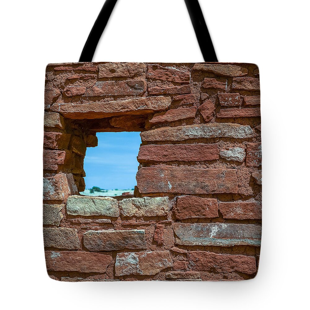 Flagstaff Tote Bag featuring the photograph Lomaki Pueblo window by Chris Bordeleau