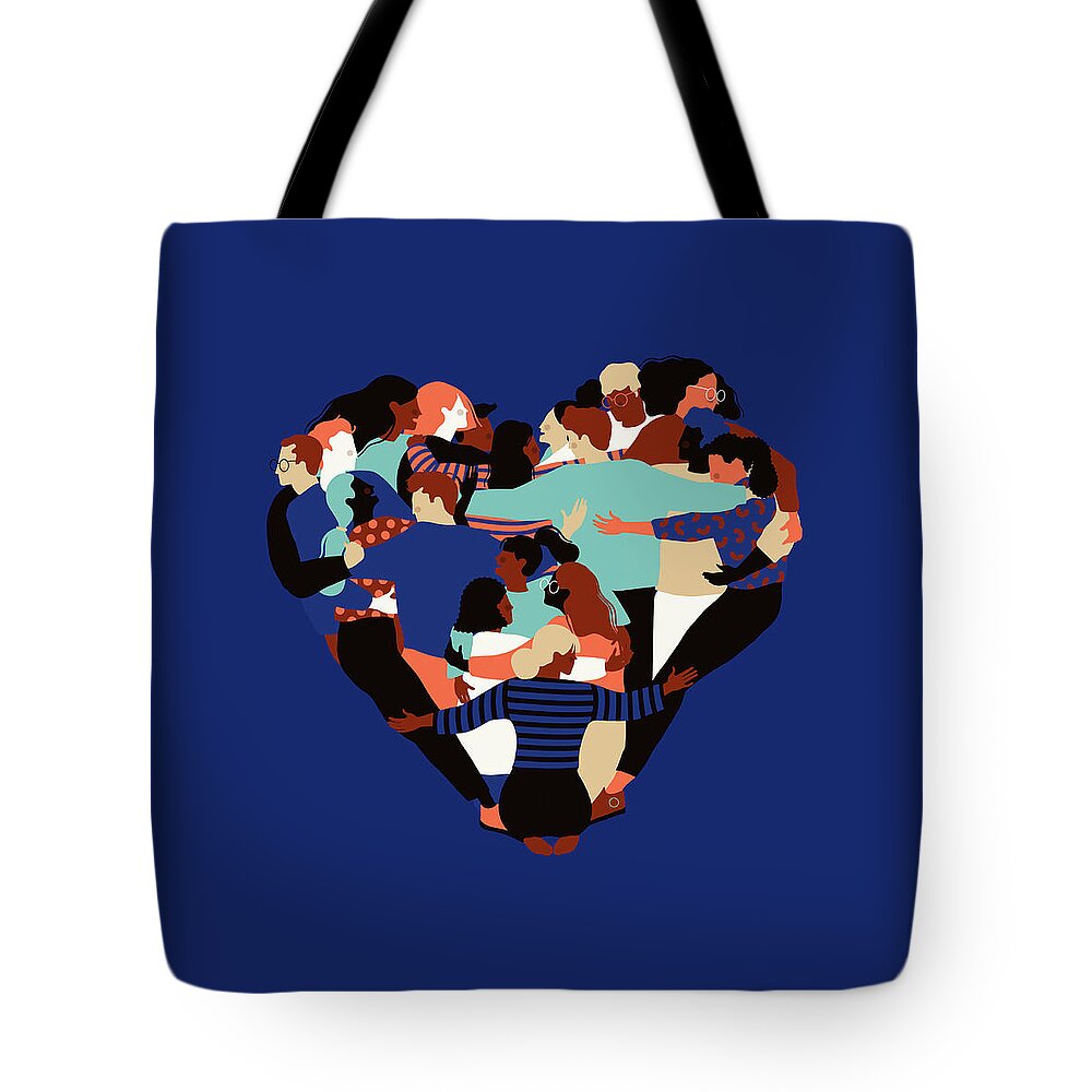 20-24 Years Tote Bag featuring the photograph Lots Of People Hugging To Form Heart by Ikon Images