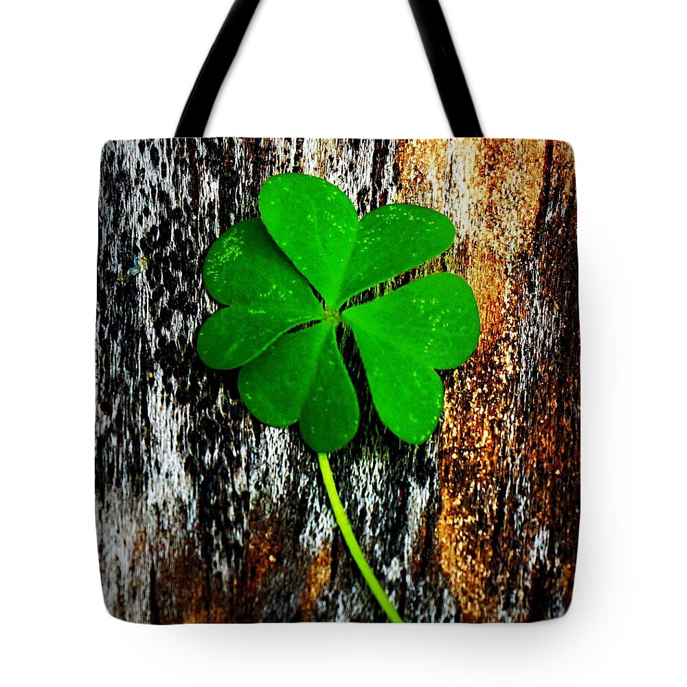 Clover Tote Bag featuring the photograph Luck by Paul Wilford