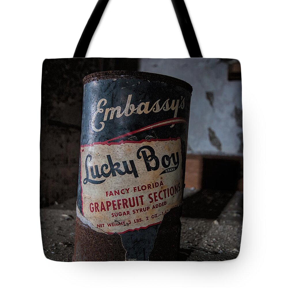 Bennett College Tote Bag featuring the photograph Lucky Boy by Rick Kuperberg Sr