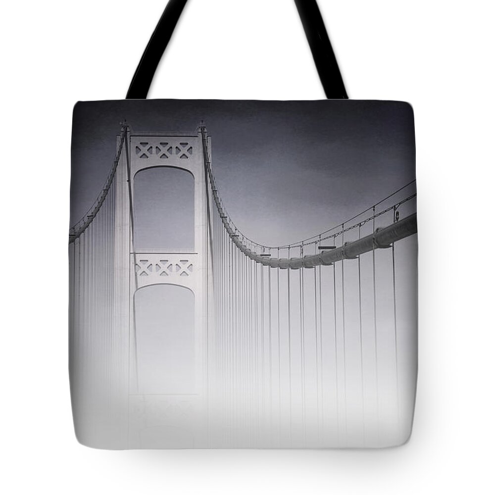 Evie Tote Bag featuring the photograph Mackinac Bridge in the Fog Michigan by Evie Carrier