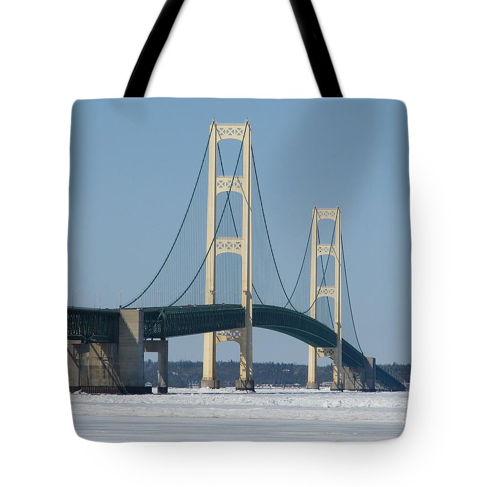 Mackinac Bridge Tote Bag featuring the photograph Mackinac Bridge in Winter by Keith Stokes