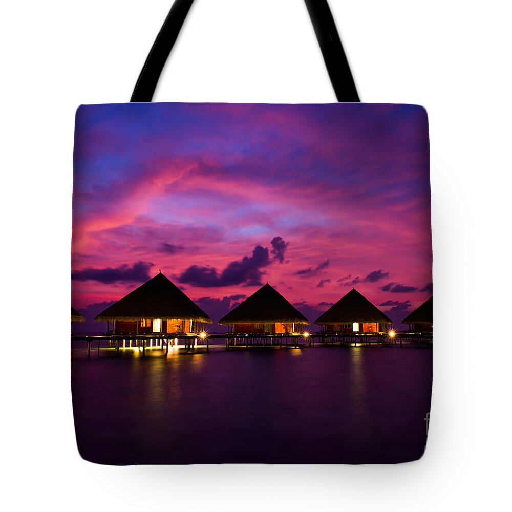 Beach Tote Bag featuring the photograph Magical Sunset by Hannes Cmarits